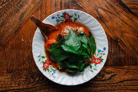 Red curry of barbecue duck with snake bean and sweet basil.