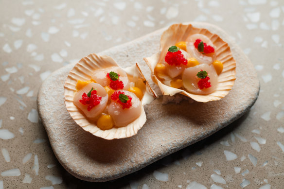 Hokkaido scallop carpaccio, pickled fennel, orange, finger lime.