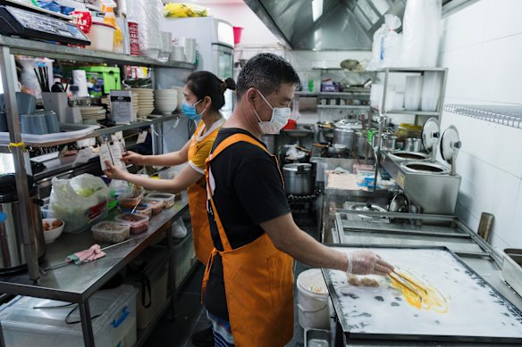 The rice paper roll is steamed in giant sheet pans. 
