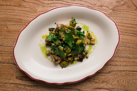 Swordfish with potatoes, capers and green olives in a herbal green dressing. 