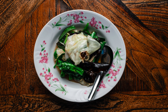 Stir-fried Asian greens with ginger and mushrooms.