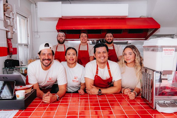 Co-owners Hector Valles (front left) and Aldo Lara (second from right) with their team. 