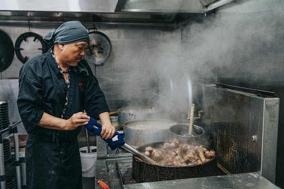 Chef Mori Hogashida making ramen at Gumshara. 