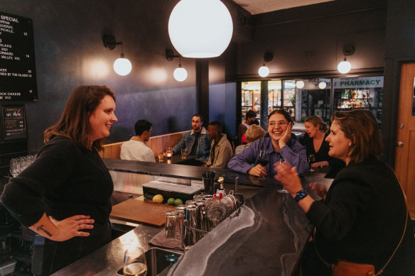 Ali Gibson Roy behind the bar.