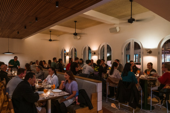 The large dining room has undergone a coastal chic makeover.