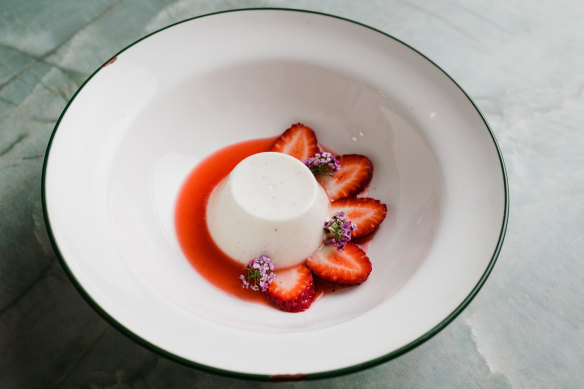Panna cotta with strawberry and rosewater syrup.