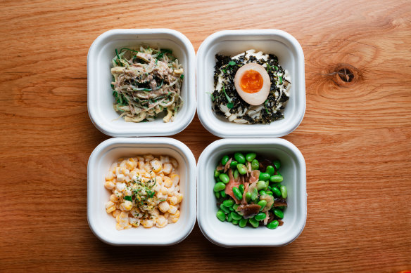Clockwise from top left: Wakame bean sprout salad, potato salad with soft egg, glazed mushroom and edamame and seasoned sweet corn.