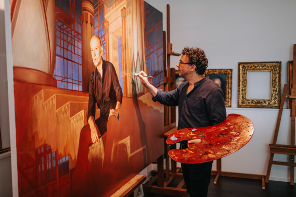 Ralph Heimans works on a portrait of the actor Ben Kingsley. He says he waits for a subject’s “unguarded moment” when they display “something different”.