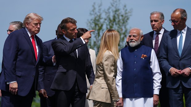 French President Emmanuel Macron points in the right direction after Donald Trump walked off the wrong way.