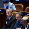 Israel’s Prime Minister Benjamin Netanyahu, surrounded by ministers from the government attends a session of the Knesset – Israel’s parliament – in Jerusalem, on Monday.