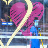 A cleaner mops the floor at a Novotel in Southbank on Friday.