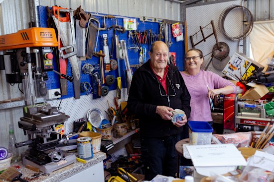 Jim Christie and his daughter, Julianne, in his workshop.
