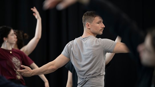 Choreographer James Batchelor with dancers rehearsing Resonance.