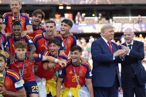 Donald Trump at FIFA World Cup final 2026: US President photobombs Spain’s big moment; Trophy presentation news, reaction  www.nine.com.au