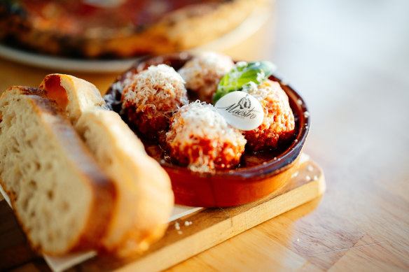 Meatballs in Neapolitana sauce with sourdough bread.