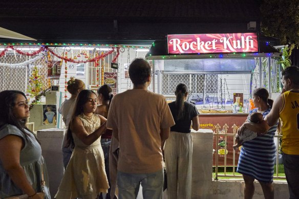 Customers outside Rocket Kulfi.