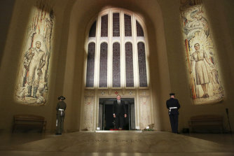 Prime Minister Scott Morrison and wife Jenny lay a wreath at the Tomb of the Unknown Soldier during the Anzac Day commemorative service at the Australian War Memorial in Canberra 