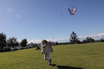 Chole takes advantage of the windy weather at Marks Park in Bo<em></em>ndi on Tuesday.