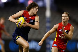 Luke Jackson shows a burst of speed for the Demons.