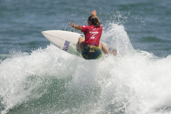 Australia’s Sally Fitzgibbons competes during the first round of the women’s surfing competition at the 2020 Summer Olympics at Tsurigasaki beach in Ichinomiya, Japan.