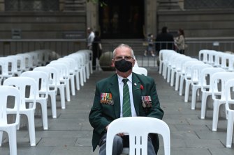 John Hitchem, 73, an army reservist for 37 years, waits for the Remembrance Day ceremony to begin.