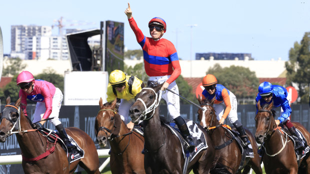 James McDonald points to the sky as Verry Elleegant wins the Ranvet Stakes. 