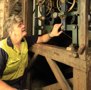 Andrew Markerink installing the refurbished workings of the Hyde Park barracks clock.