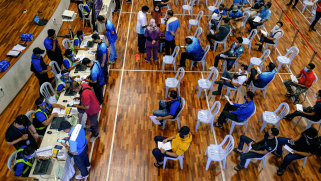 People register at a vaccination centre in Selangor, Malaysia’s most populous state.