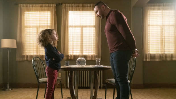 Chloe Coleman (Sophie) and Dave Bautista (J..J.) in My Spy.