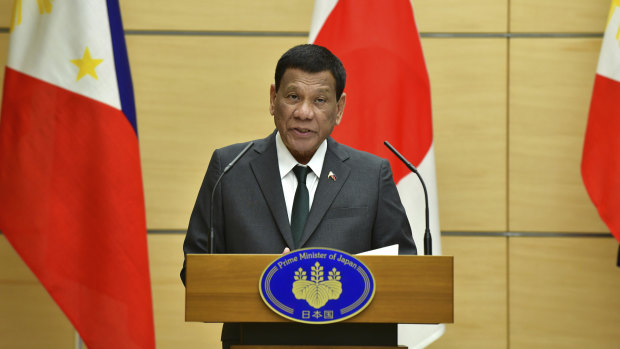 Philippine President Rodrigo Duterte delivers a speech in Tokyo.