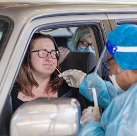 Wiradjuri woman Tiani Bartlett getting a COVID-19 test in Dubbo. She is looking to have her entire family vaccinated.