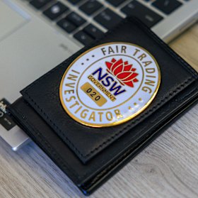 Badges displayed by the taskforce when entering an agency.