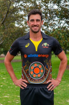 Mitchell Starc models Australia's Indigenous cricket uniform.