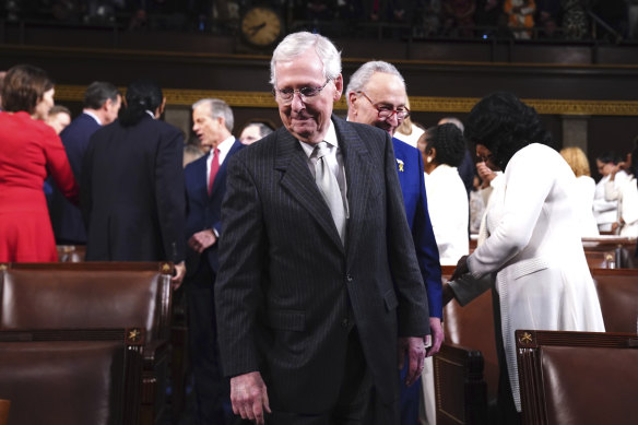 Mitch McConnell arrives for the address.