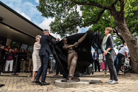 Belinda Clark (right) is joined by NSW Premier Dominic Perrottet and former governor-general Quentin Bryce outside the SCG.