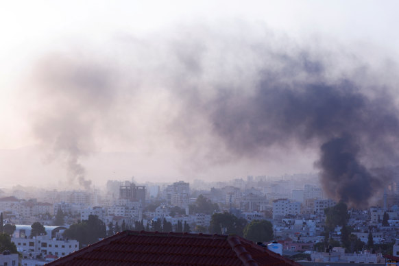 Smoke rises during an Israeli military operation in Jenin, in the Israeli-occupied West Bank on Monday, July 3.