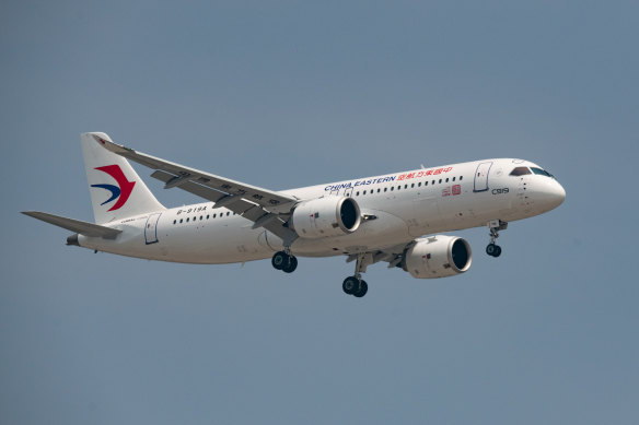 China Eastern’s C919 arrives at Beijing Capital International Airport on its maiden commercial flight on Sunday.