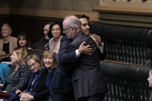 Sydney MP Alex Greenwich hugs fellow independent MP Greg Piper as the bill passed. 