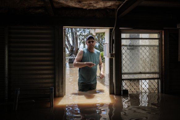 Broady Logan surveys the flood damage around his Gunnedah home.