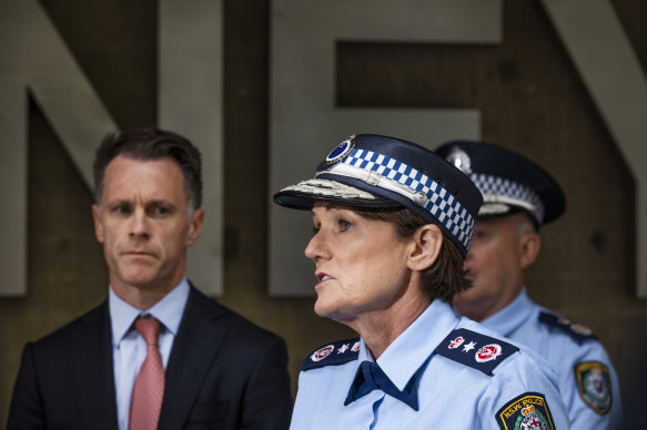 NSW Police Commissioner Karen Webb addresses the media beside Premier Chris Minns on Tuesday morning.