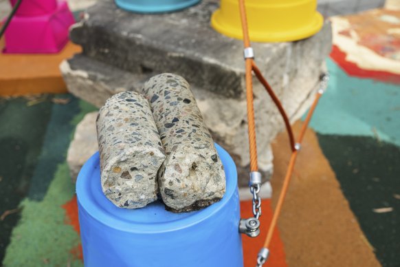 Some parents are concerned about the small concrete pieces in the new playground.