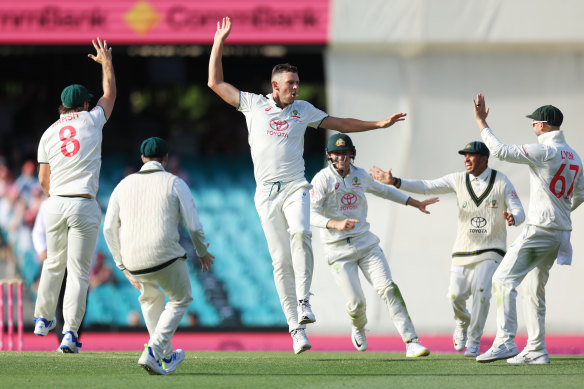 Josh Hazlewood celebrates the wicket of Salman Ali Agha.