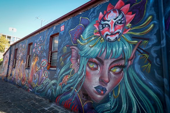 Artwork on the other side of the same laneway, also produced by Lauren YS. 