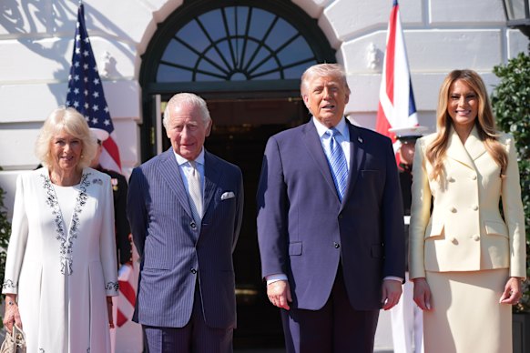The group posed for pictures after King Charles and Queen Camilla arrived at the White House on Tuesday morning (AEST).