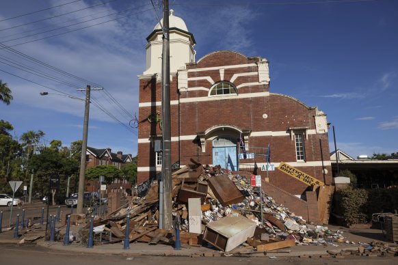 Furniture and debris piled high on the streets of Lismore after it was devastated by record floods in February 2022. 