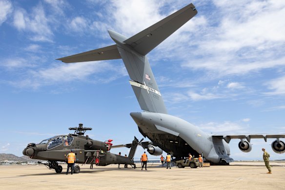 AH-64E helicopters are unloaded from the USAF C-17 Globemaster in Townsville in September.