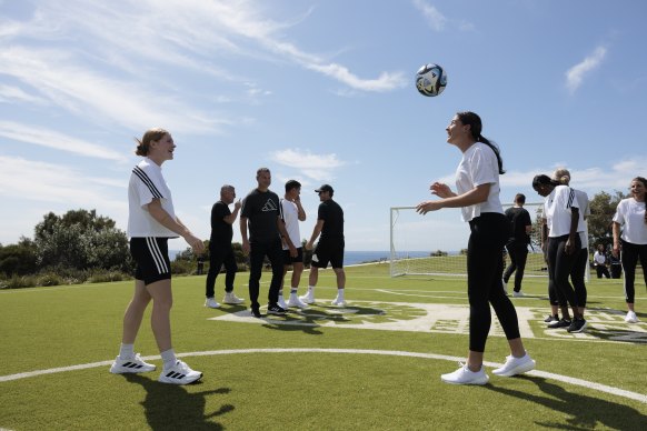 Cortney Vine and New Zealand’s Claudia Bunge head the Oceaunz ball to each other at Bondi.