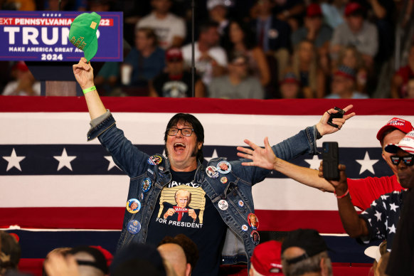 An attendee reacts as Republican presidential candidate, former US president Donald Trump holds a campaign rally in Erie, Pennsylvania.