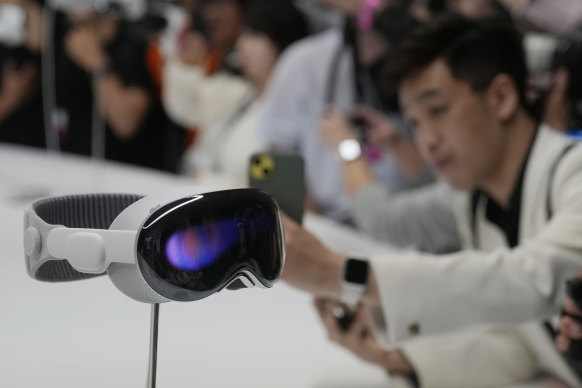 The Apple Vision Pro headset is displayed in a showroom on the Apple campus in Cupertino, California.