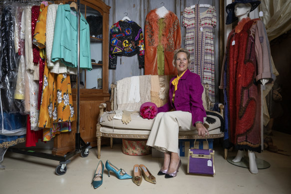 Fashion collector Charlotte Smith with some of her vintage clothing at Dirty Janes, Bowral.